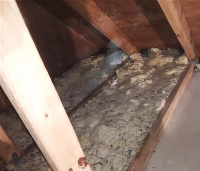 Damaged and weakened insulation due to fire damage. 