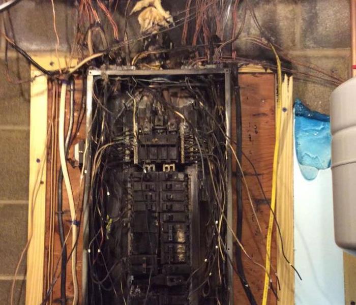 The damaged electrical box after catching on fire. 